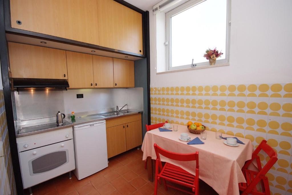 Residence Elite Marina di Campo Rom bilde